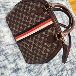 Brown Patterned Handbag with Red Stripe